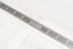 Linear shower drain system. With grate. Drainage at bathroom