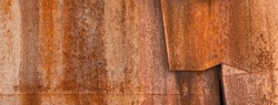 fragment of an old rusty volumetric structure or wall, rust effect, texture or background