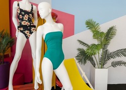 Mannequins in colorful swimsuits in clothes shop. Summer vacation. Fashion model. Colorful vacation concept