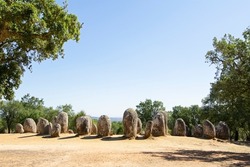 neolithic stones circle  on  Almendres Cromlech  a megalithic complex of more than 100 stones in Alentejo region , Evora, Portugal