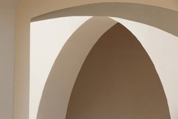 abstract lines of arches. art and design concept. shadow texture. space for text. Light and shadow on gray wall.