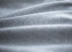 Texture of fabric. Gray macro fabric. Gray background
