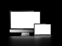 two computers with white screen on a dark background