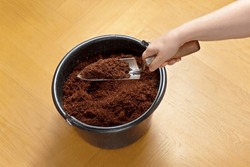 How to make cheap and eco-friendly soil from coco coir bricks, step 5: break up any left chunks with a trowel and use for potting or gardening.