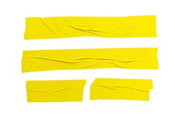 Set of  different size yellow adhesive sticky tapes. Torn crumpled sellotape pieces collection isolated on white background