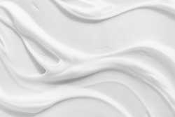 White foam cream texture. Cosmetic cleanser, shower gel, shaving foam background. Creamy cleansing skincare product bubbles