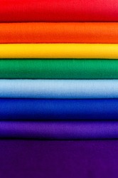 Pile of fabrics in rainbow colors