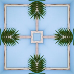 Green mandala from palm leaves and wooden frame on blue background. Made from natural objects. Symmetry ornament . Fractals and kaleidoscope. abstract kaleidoscopic arabesque. geometrical pattern
