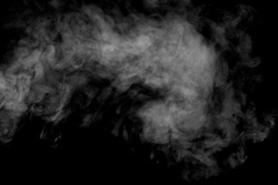 Abstract steam on a black background. Texture. Design element. Abstract art. The steam from the iron. Macro shooting.