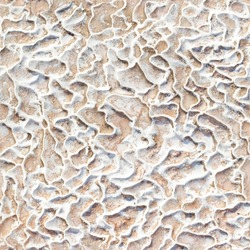 Seamless texture of Pamukkale calcium travertine in Turkey, uneven pattern of cells.