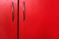 Red wooden cabinet door close