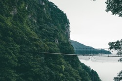 Wooden hanging bridge over valley on Wugong Mountain (Wugongshan) in Jiangxi, China