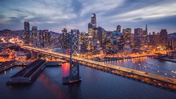 Aerial cityscape view of San Francisco and the Bay Bridge at Night, California, USA