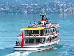Tourist passenger boats across Lake Brienz (Brienzersee) on the ferry line Giessbach See - Brienz - Canton of Bern, Switzerland (Kanton Bern, Schweiz)