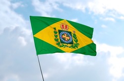 Empire of Brazil Flag in Front of Blue Sky - Realistic 3D Rendering