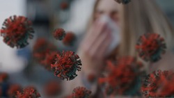 VIRUS VERSION 2. Sick ill european girl sneezes in handkerchief on street and spreads the virus bacteria in the air