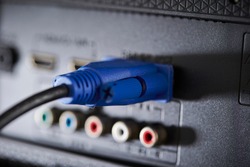 Blue VGA cable connected with electrical appliances