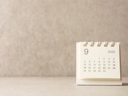 September 2022 calendar on gray background 