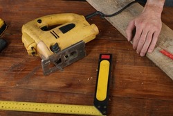 carpentry tools on the table with hand