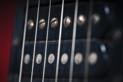 The pickups on old electric guitar
