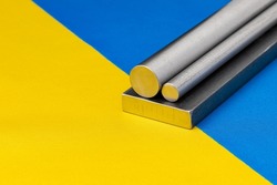 Steel and Iron on Ukraine flag. Ukrainian steel exports, trade and industry concept.