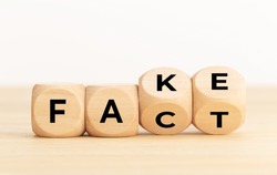 Fact or Fake concept. Wooden blocks with text. Copy space