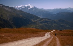 
Lonely traveler on the road. Svaneti, Georgia.