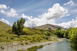 The Mataura River between Athol and Nokomai in the Southland District, New Zealand, seen from the Mataura River Suspension Bridge 