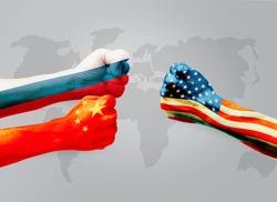 Flags of usa or United States of America VS China and  Russia on hands punch to each others on world map background, Conflict world concept