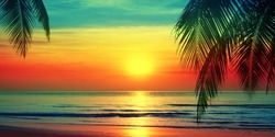 Beautiful sunset beach landscape, exotic tropical island nature, blue sea water, ocean waves, colorful red yellow sky, palm tree leaves silhouette, golden sun glow reflection, summer holidays vacation