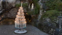 The Grotto of Massabielle is the place where the Virgin appeared to Bernadette Soubirous, a 14-year-old girl, from Lourdes, France, in 1858. At the back left of the Grotto is the Spring.