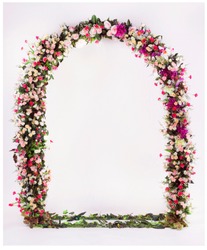 flower arch with flowers, branches and leaves
