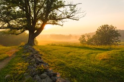 Foggy sunrise on East Cemetery Hill at Gettysburg National Military Park in Gettysburg, PA, USA.