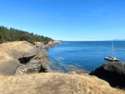 A beautiful view of the coastline along Hornby Island.  Views are from a trail in Helliwell Provincial Park, on a beautiful sunny summer day in the Gulf Islands, British Columbia.