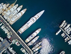 A stunning view of mega yachts in Port Hercules, Monaco. 