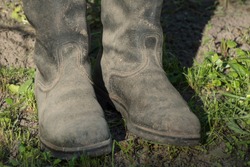 Old chrome boots. Footwear for hard work in industry or agriculture.