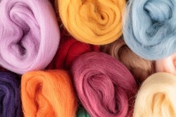 Multi-colored merino wool of high quality, for felting, needlework, knitting, making crafts and clothing, close-up