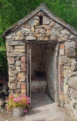 Victorian outside toilet, also known as an outhouse.
