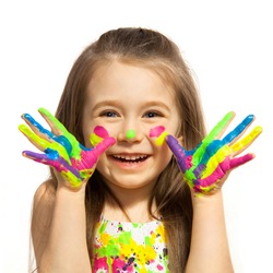 Funny little girl with hands painted in colorful paint. Isolated on white background.