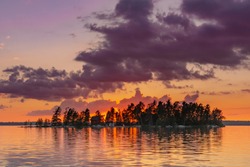 Orange Skies Behind Island and Lake in Minnesota