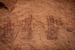 Multiple Pictograph Handprints On Sandstone Wall in canyonlands National Park