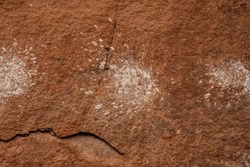 Splattering Pictographs On Wall At Peekaboo Spring in Canyonlands National Park