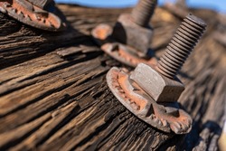 Wooden Pylon with Rust Bolts and Screws at Ore Terminal in Big Bend