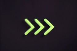 Green arrows pointing right side. 3D mockup, pointer sign pointing direction on black background. Right way concept.