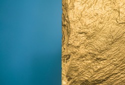Gold texture. Rough structure mineral. Rock texture. Gold Ore. Gold rocks. Stone background.