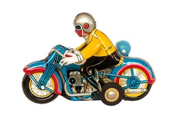 Vintage tin motorcycle or motorbike clockwork toy collectible isolated on white