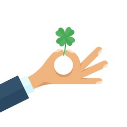 Businessman holding a four leaf lucky green clover. Good luck and lucky charm symbol. Flat style cartoon colorful concept vector illustration isolated on white background.