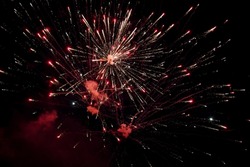 Fourth of July Fireworks Celebration.  Fireworks display on dark sky background.