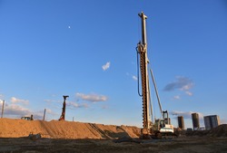 Vertical tamrock pile foundation drilling machine. Drill rig at construction site. Ground Improvement techniques, vibroflotation probe. Vibro compaction method. Piling Contractors