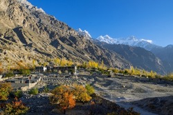 Autumn view of Hunza valley with Mount Rakaposhi (7,788m) - a mountain in the Karakoram mountain range of the Gilgit-Baltistan territory of Pakistan.